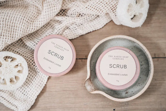 Embedded loofah scrub on soap dish